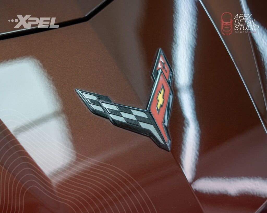 A Chevrolet C8 Corvette with a gleaming exterior and pristine interior after expert detailing. 