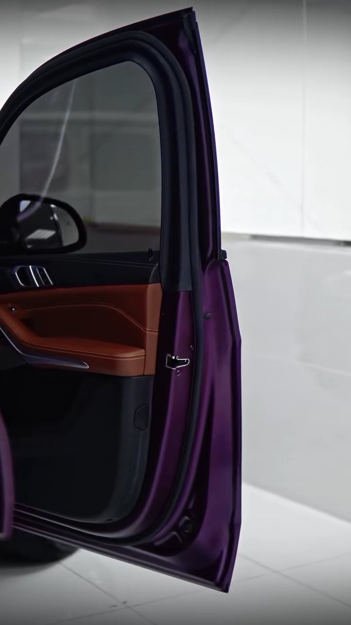 BMW X5 open door showing purple colour PPF in the door shut, Dubai