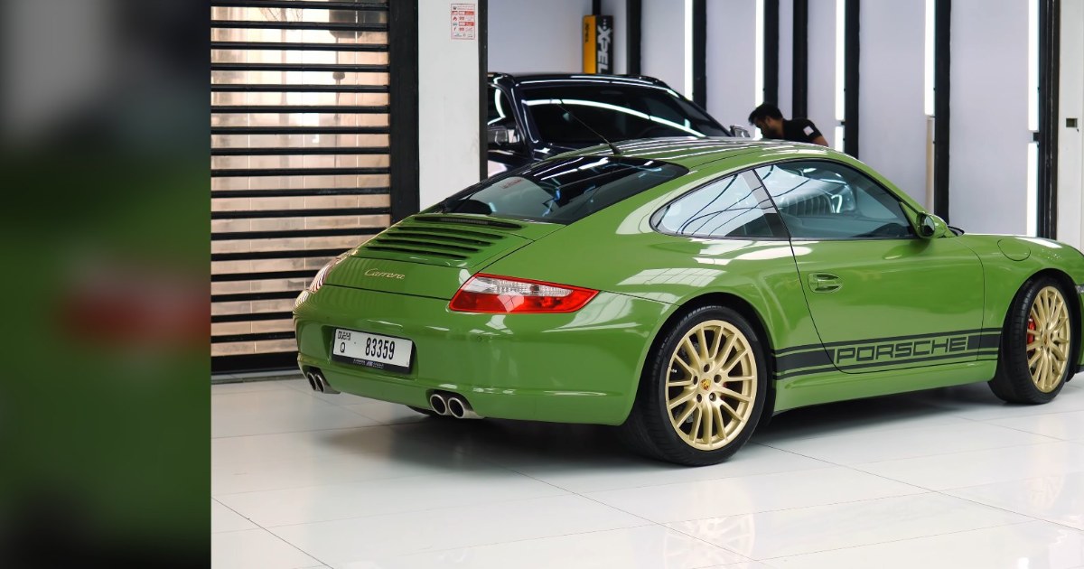 Porsche 911 997 mirror and door finished in green colour PPF at Apex Detail Studio