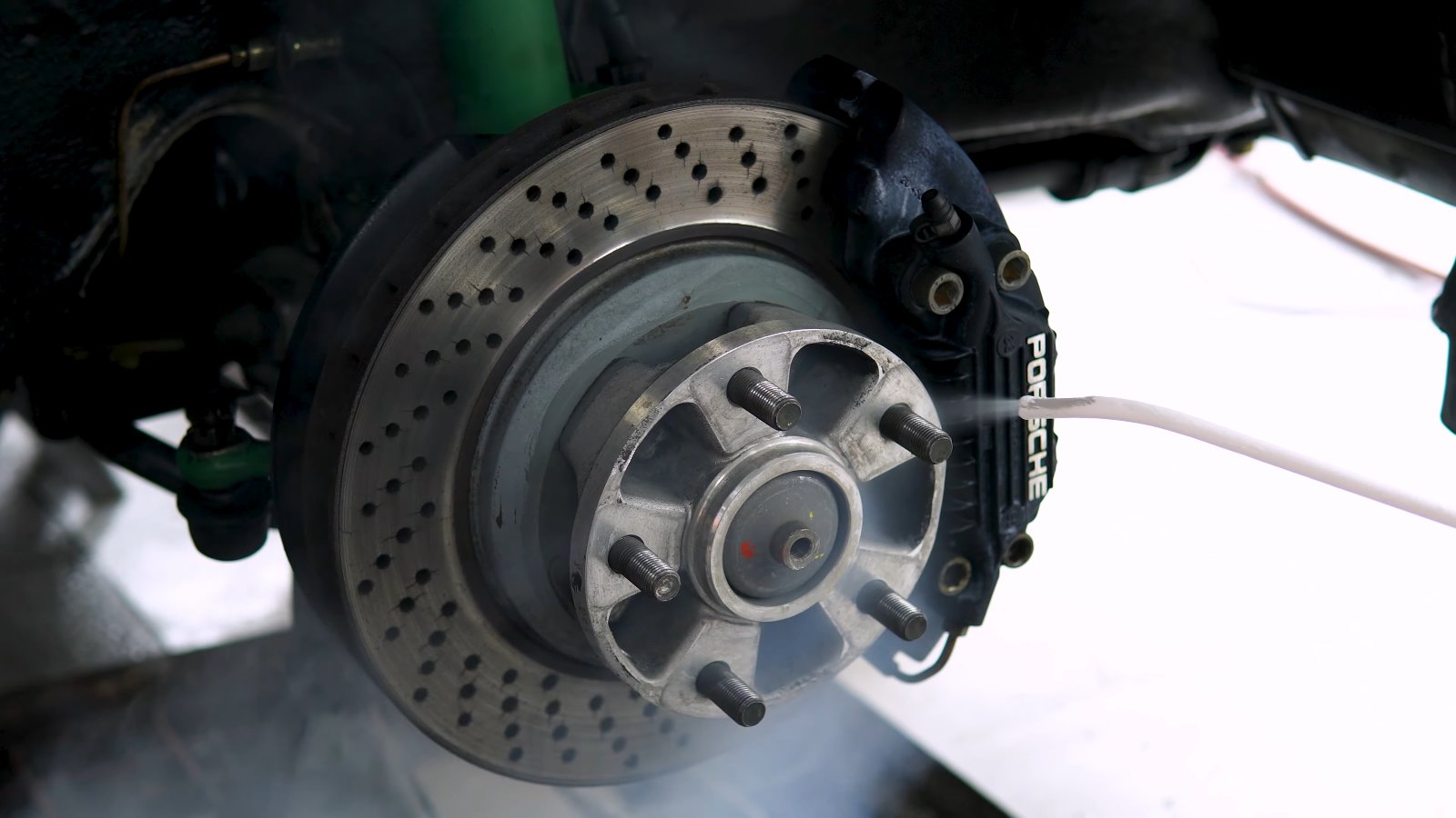 Porsche 930 Turbo brake disc and hub cleaned with dry ice at Apex Detail Studio
