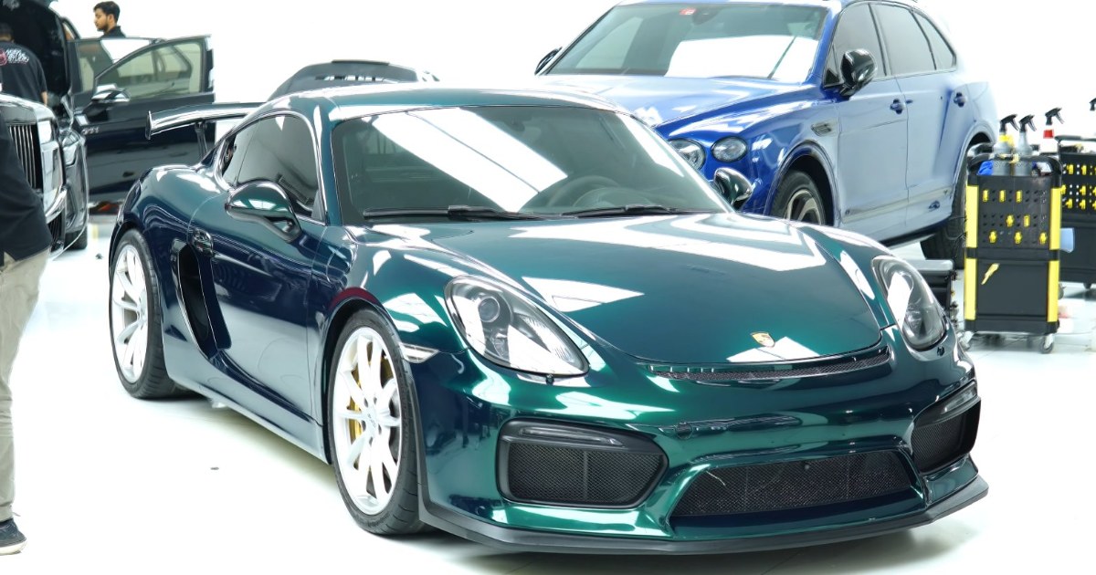 Porsche Cayman GT4 in metallic green colour PPF, rear three quarter, Apex Detail Studio