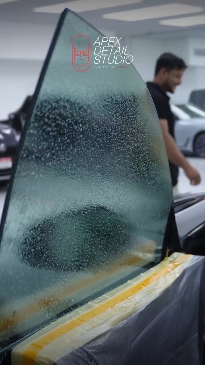 Tesla Model S Plaid door glass wetted for window tint at Apex Detail Studio Dubai